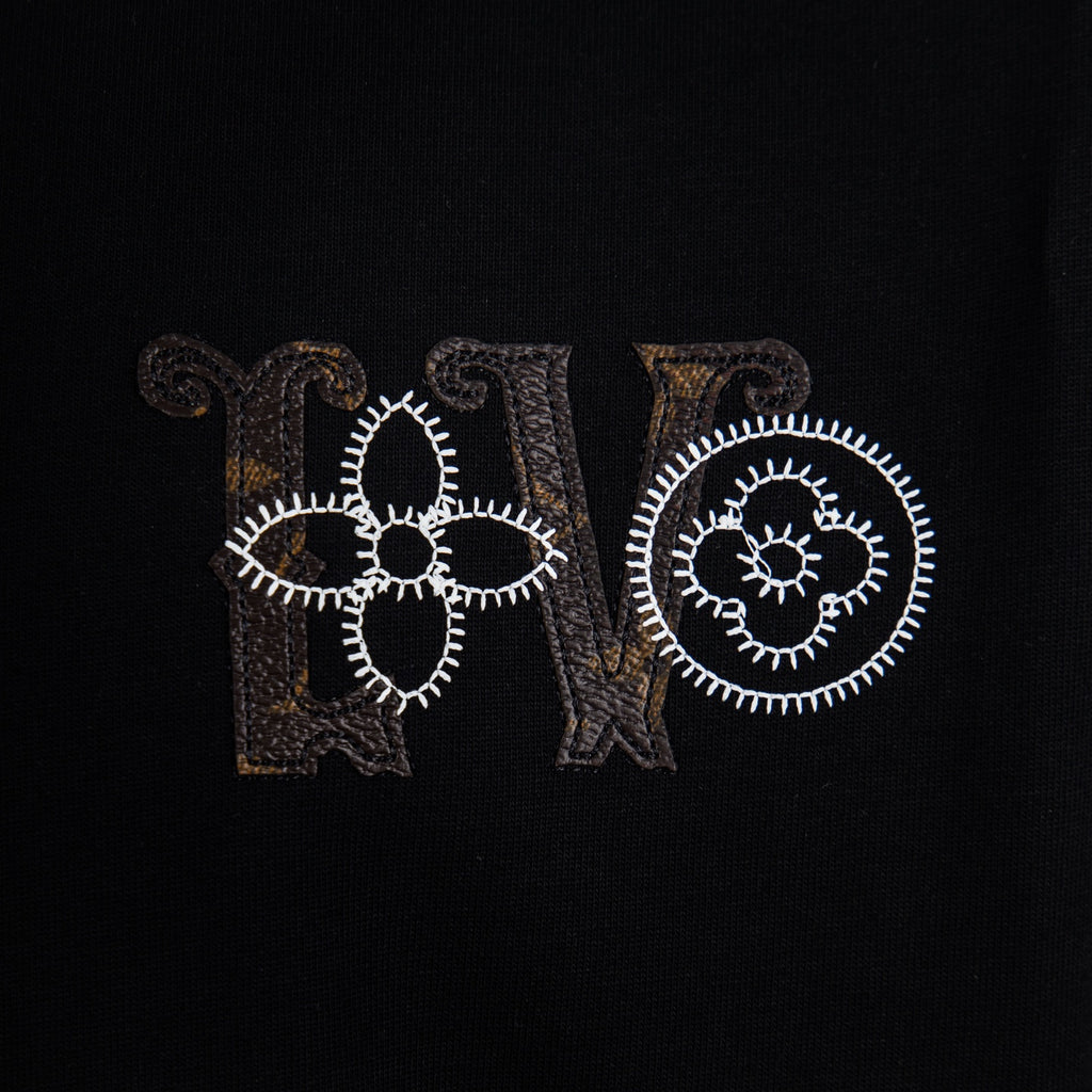 Embroidered LV and PARIS lettering on black T-shirt front