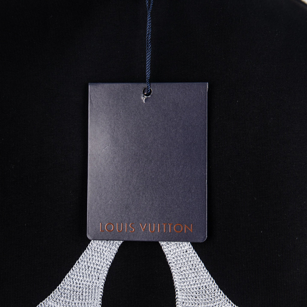 Black T-shirt with Louis Vuitton hang tag on blue string
