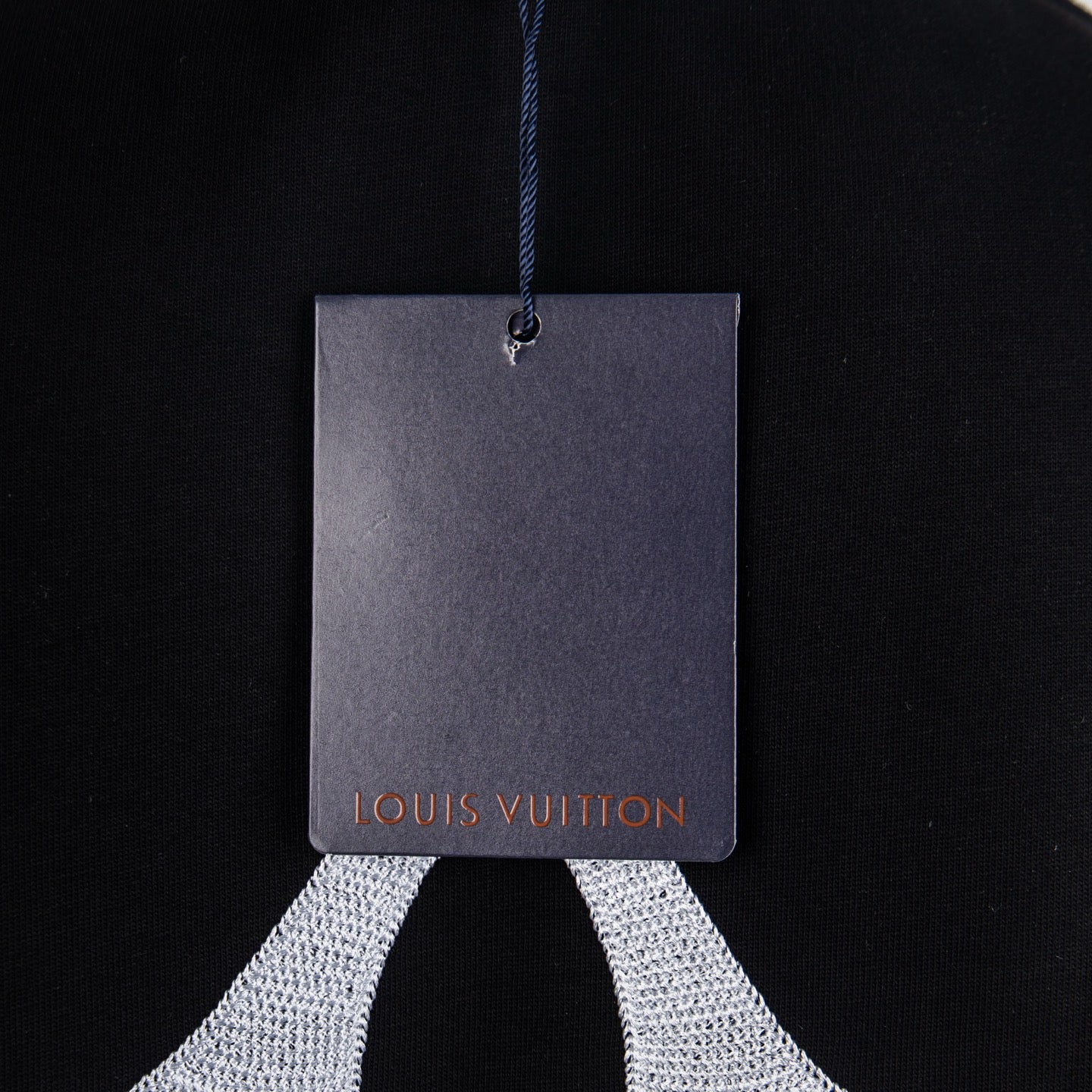 Black T-shirt with Louis Vuitton hang tag on blue string