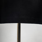 Black T-shirt hem with stitched seam close-up