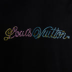 Black T-shirt chest text and rhinestone letters close-up