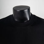Black T-shirt crew neck collar close-up