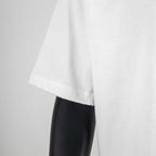 White short-sleeve T-shirt with straight hem and relaxed drape