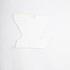 White T-shirt with raised Louis Vuitton-style logo appliqué