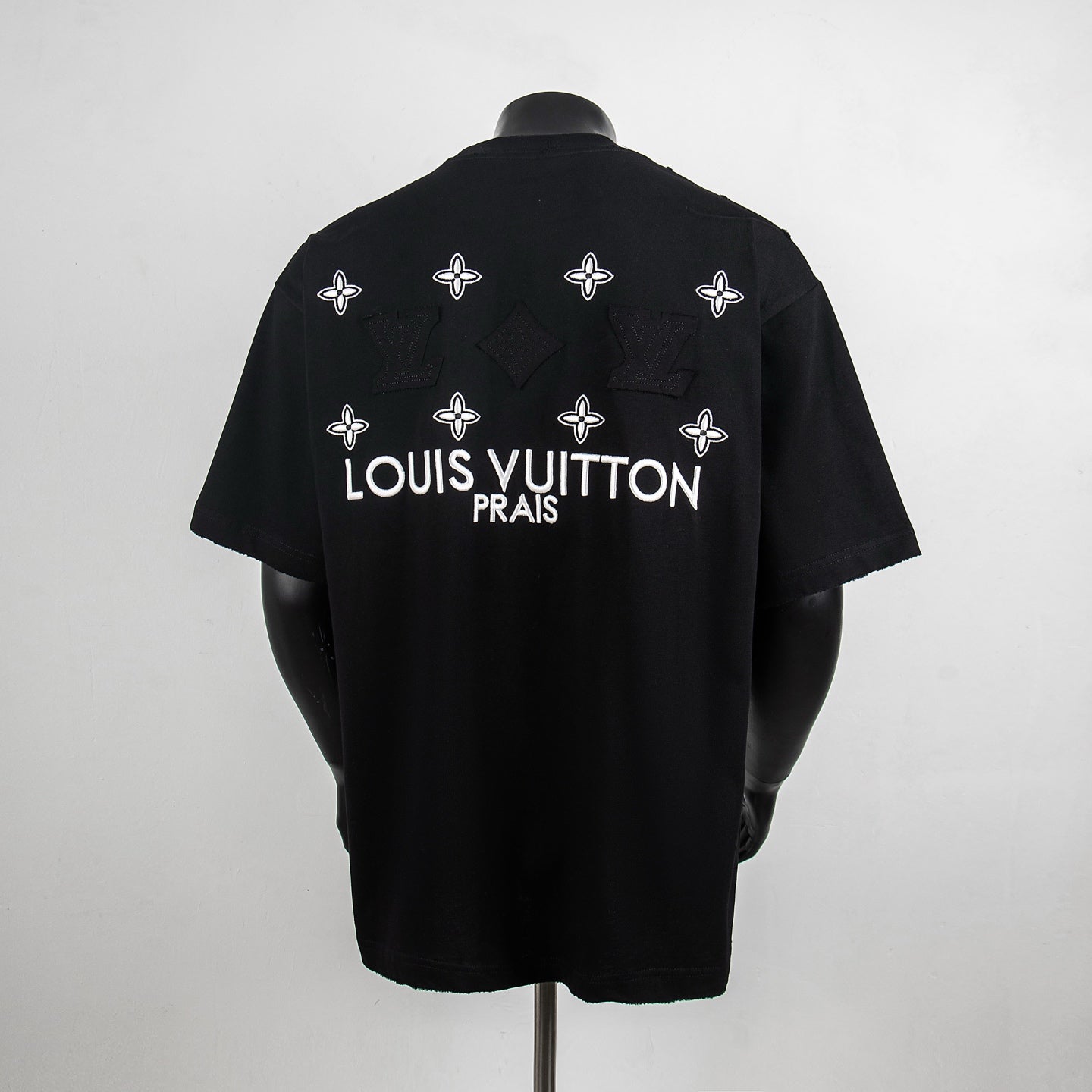 Black crew-neck T-shirt with back Louis Vuitton Prais graphic and star motifs