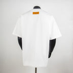 Louis Vuitton white T-shirt, short sleeves, back view with neckline tag.