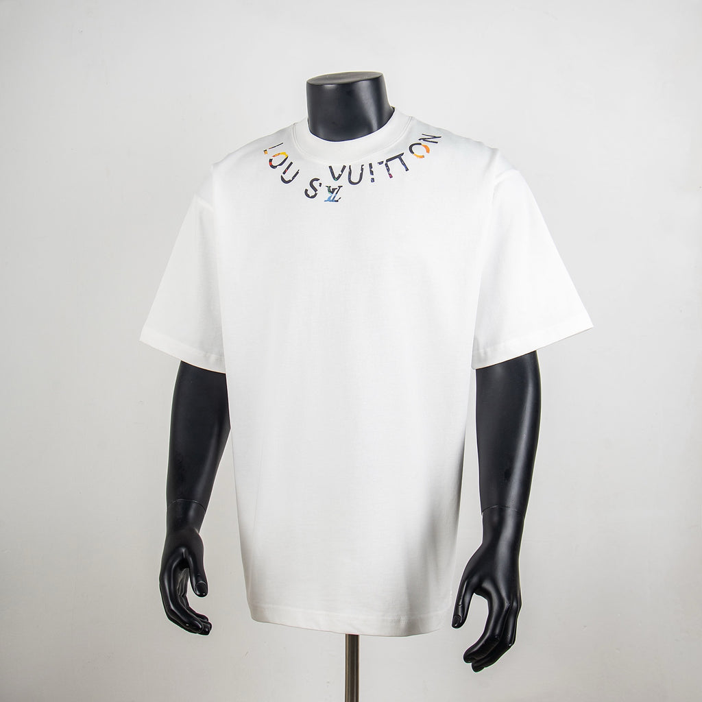 Louis Vuitton T-shirt in white with colorful logo print and crew neck.