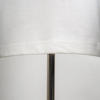 Louis Vuitton white T-shirt hem stitching seam detail.
