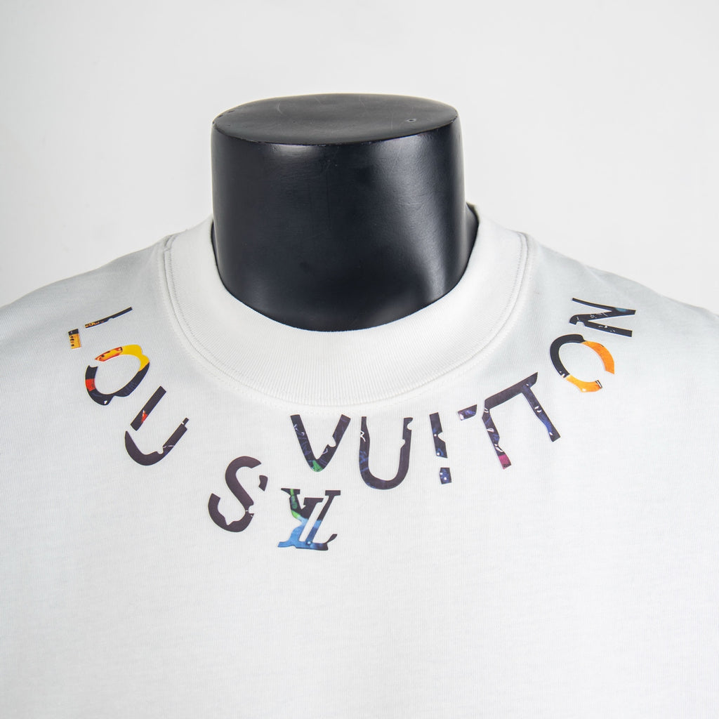 Louis Vuitton white T-shirt neckline with multicolor logo graphic detail.