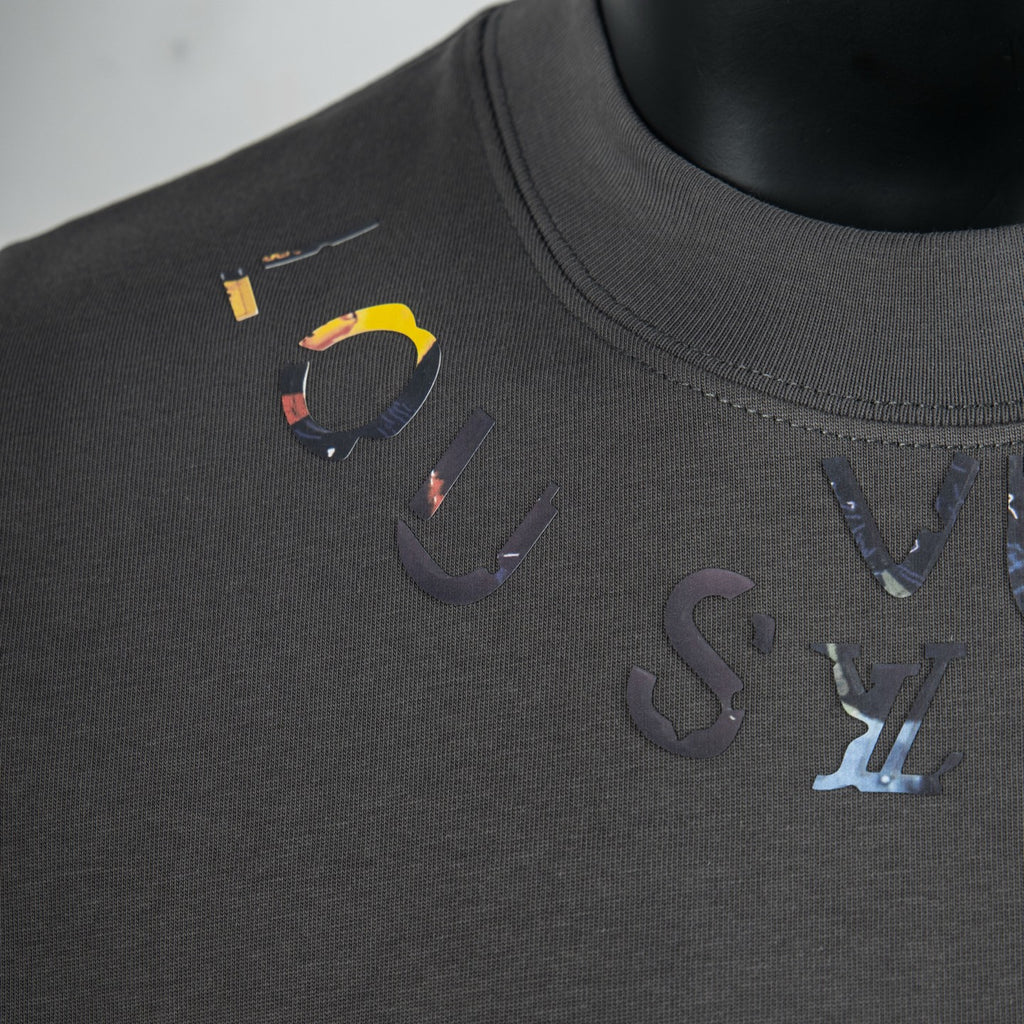 Dark gray short-sleeve T-shirt with multicolor logo graphic and embroidered details