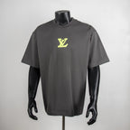 Charcoal short-sleeve T-shirt with neon green LV logo on front