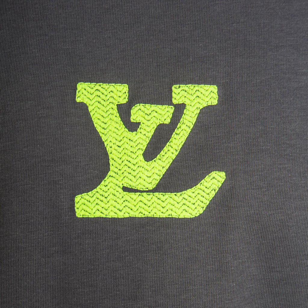 Neon green LV logo graphic on charcoal short-sleeve T-shirt