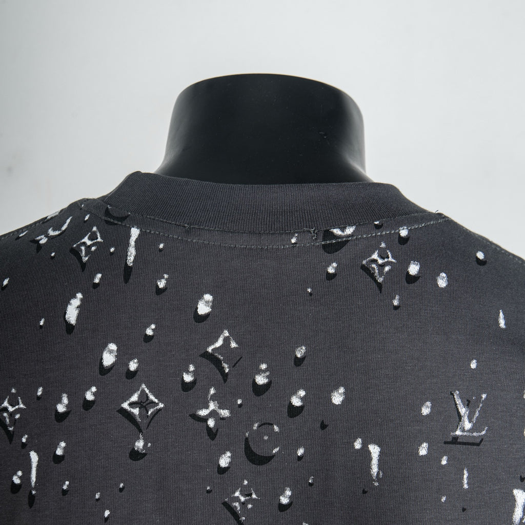 Black T-shirt with white logo pattern around back neckline