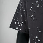 Black short-sleeve T-shirt with white logo pattern on sleeve