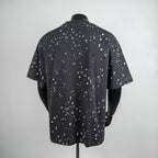 Black short-sleeve T-shirt with allover white logo pattern, crew neck