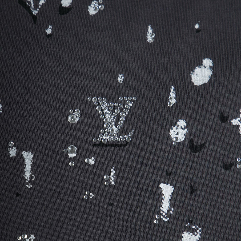 Louis Vuitton black shirt fabric with white glittery emblem and star motifs
