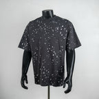 Louis Vuitton black short-sleeve shirt with scattered white emblem pattern