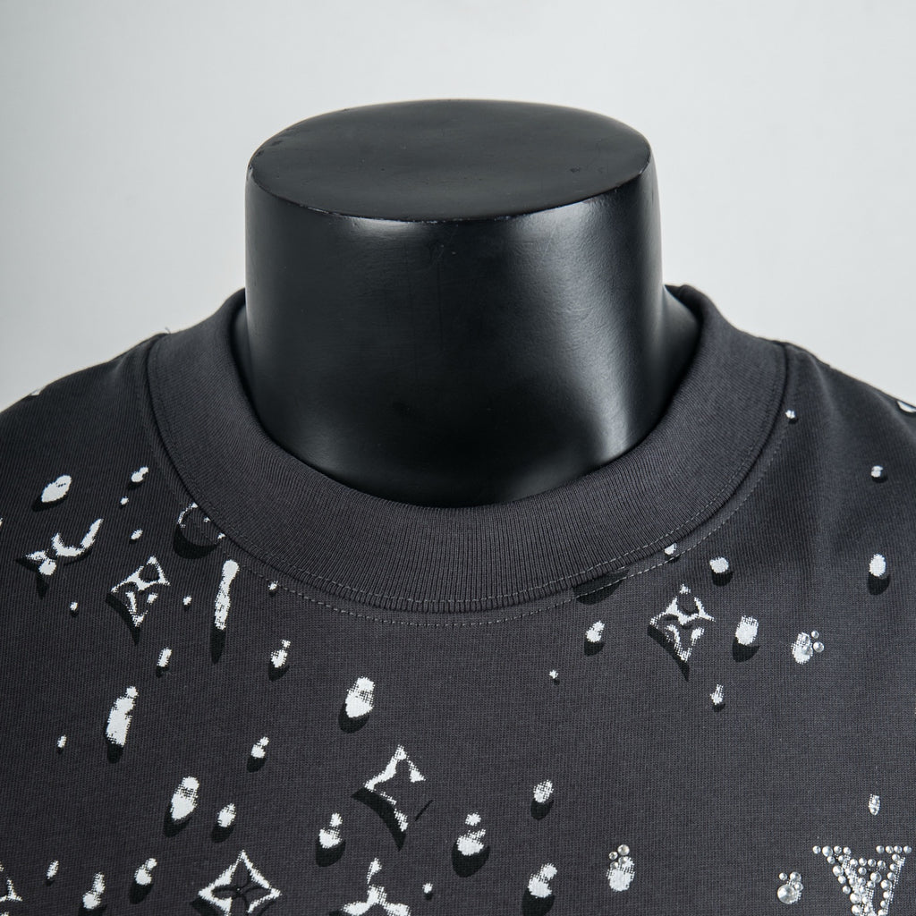 Black crew-neck T-shirt with white logo print detail at collar