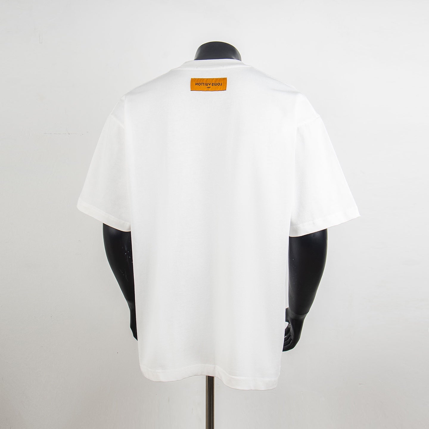 White short-sleeve T-shirt back view with small neck label