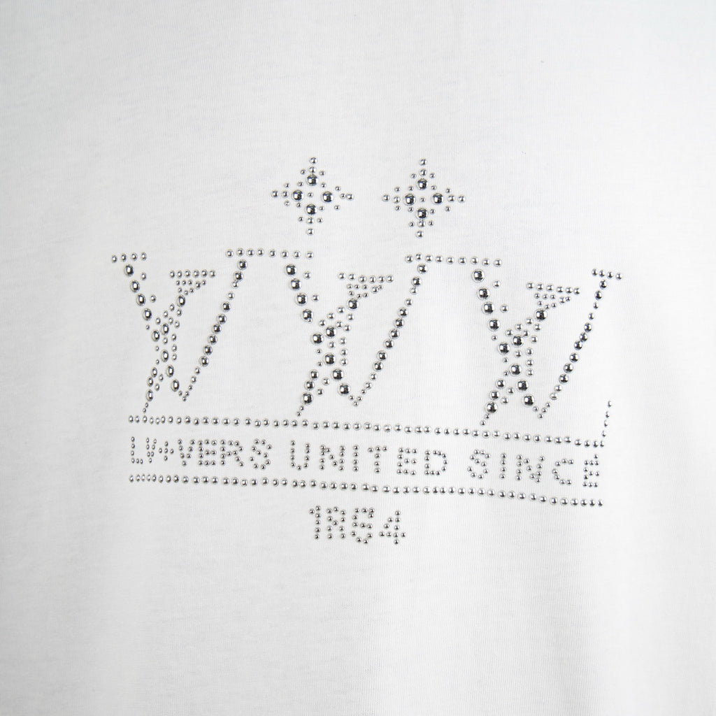 White T-shirt with rhinestone text and star logo graphic