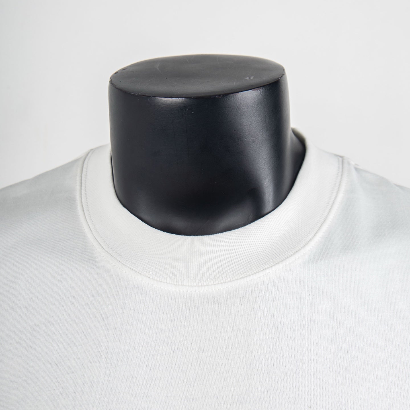 White T-shirt neckline detail with ribbed crew neck