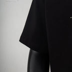 Black T-shirt side view with short sleeve and straight hem