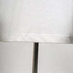 White T-shirt hem seam detail with reinforced stitching line