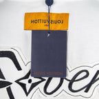 Neck label and price tag area on white T-shirt with Louis Vuitton branding
