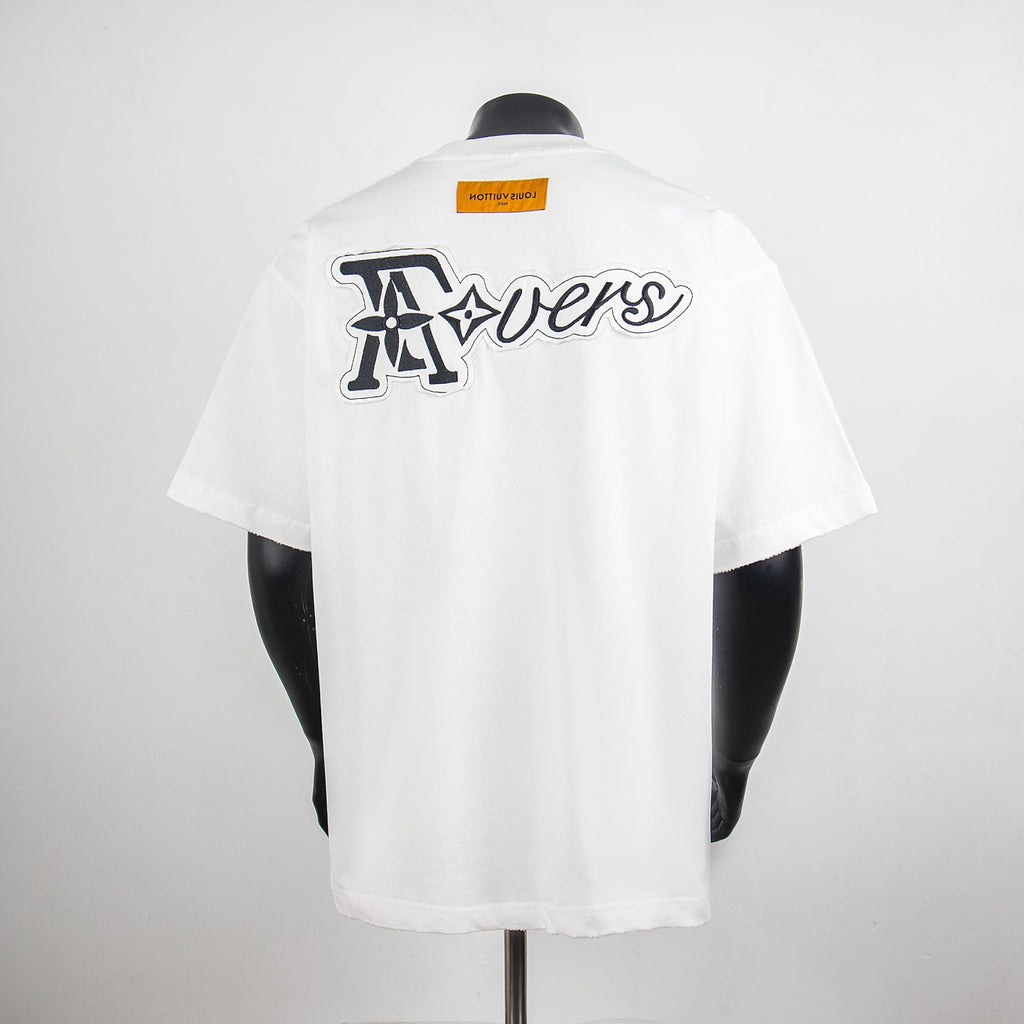 White T-shirt with large back graphic logo and small rectangular Louis Vuitton label