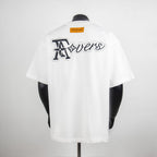 White T-shirt with large back graphic logo and small rectangular Louis Vuitton label