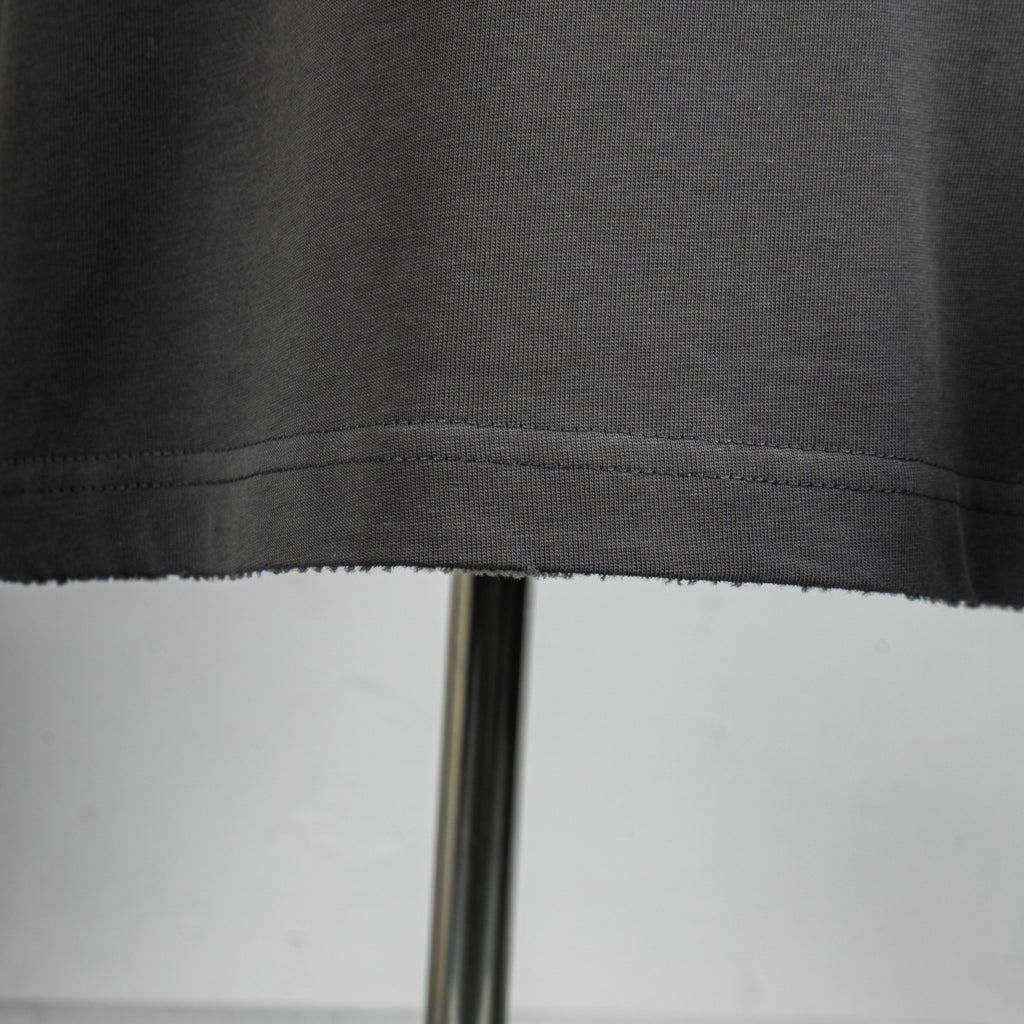 Dark gray T-shirt hem stitching close-up