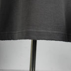Dark gray T-shirt hem stitching close-up