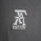 Dark gray T-shirt with embroidered chest logo detail