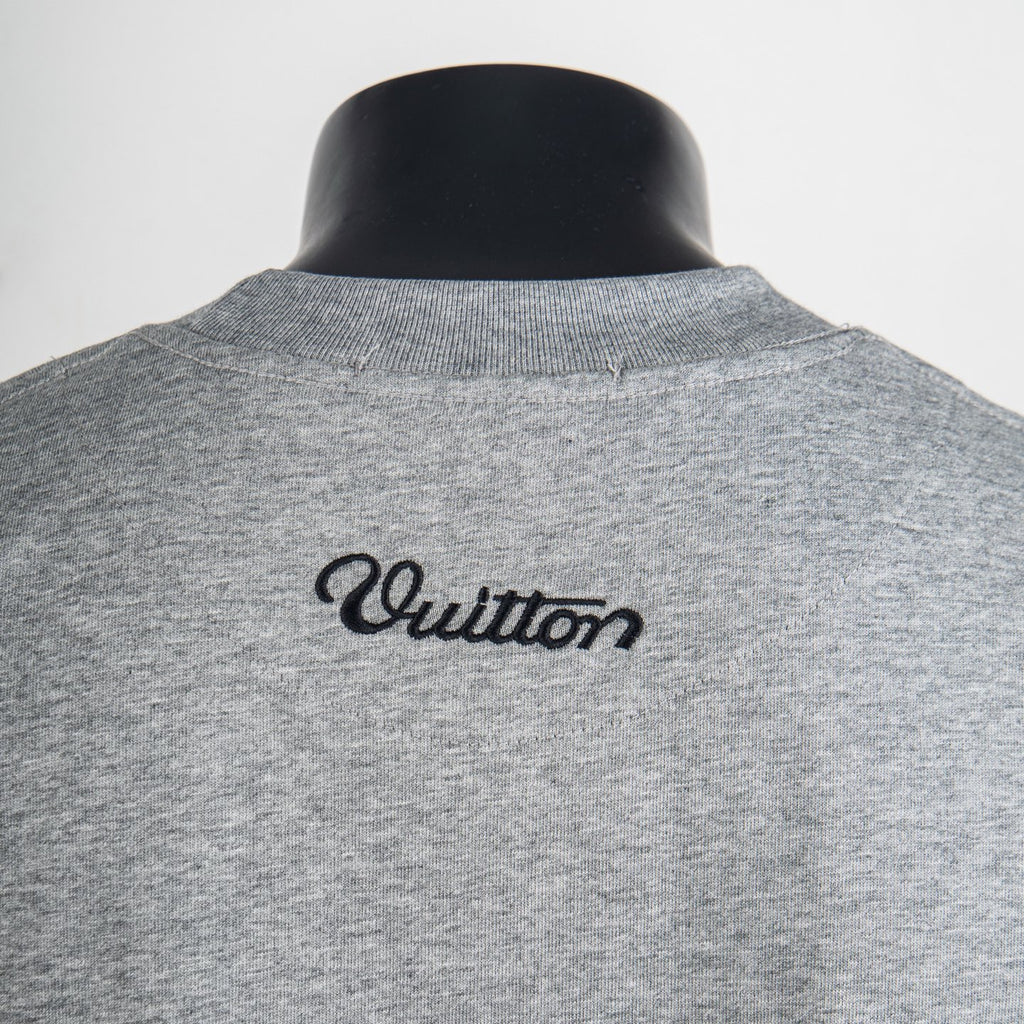 Heather gray T-shirt with black Vuitton script logo on back