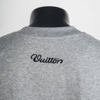 Heather gray T-shirt with black Vuitton script logo on back