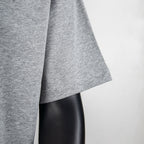 Heather gray T-shirt sleeve in three-quarter view