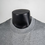Heather gray crewneck T-shirt collar on a mannequin