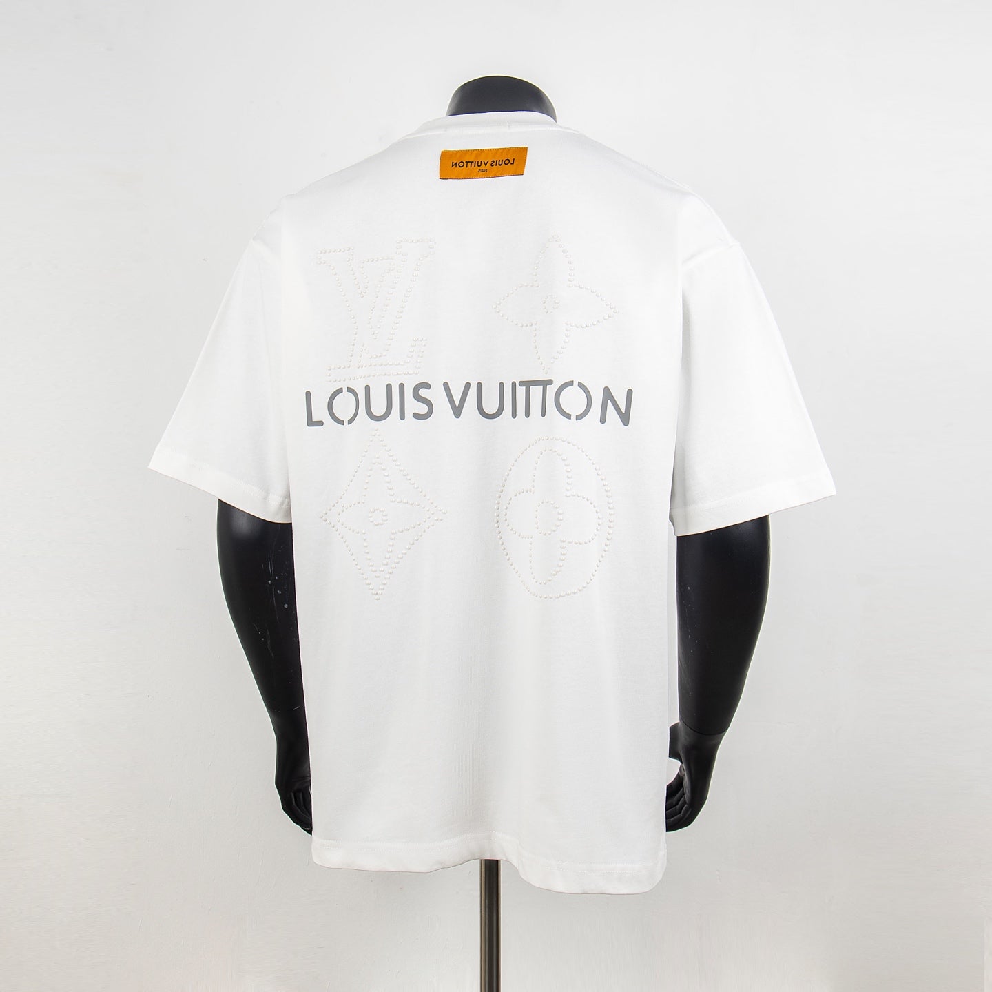 White crew-neck T-shirt with Louis Vuitton lettering and embossed logo on back