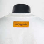 White T-shirt with orange Louis Vuitton neck label