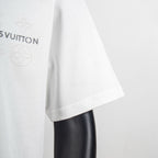White T-shirt sleeve and side seam detail with short cuff
