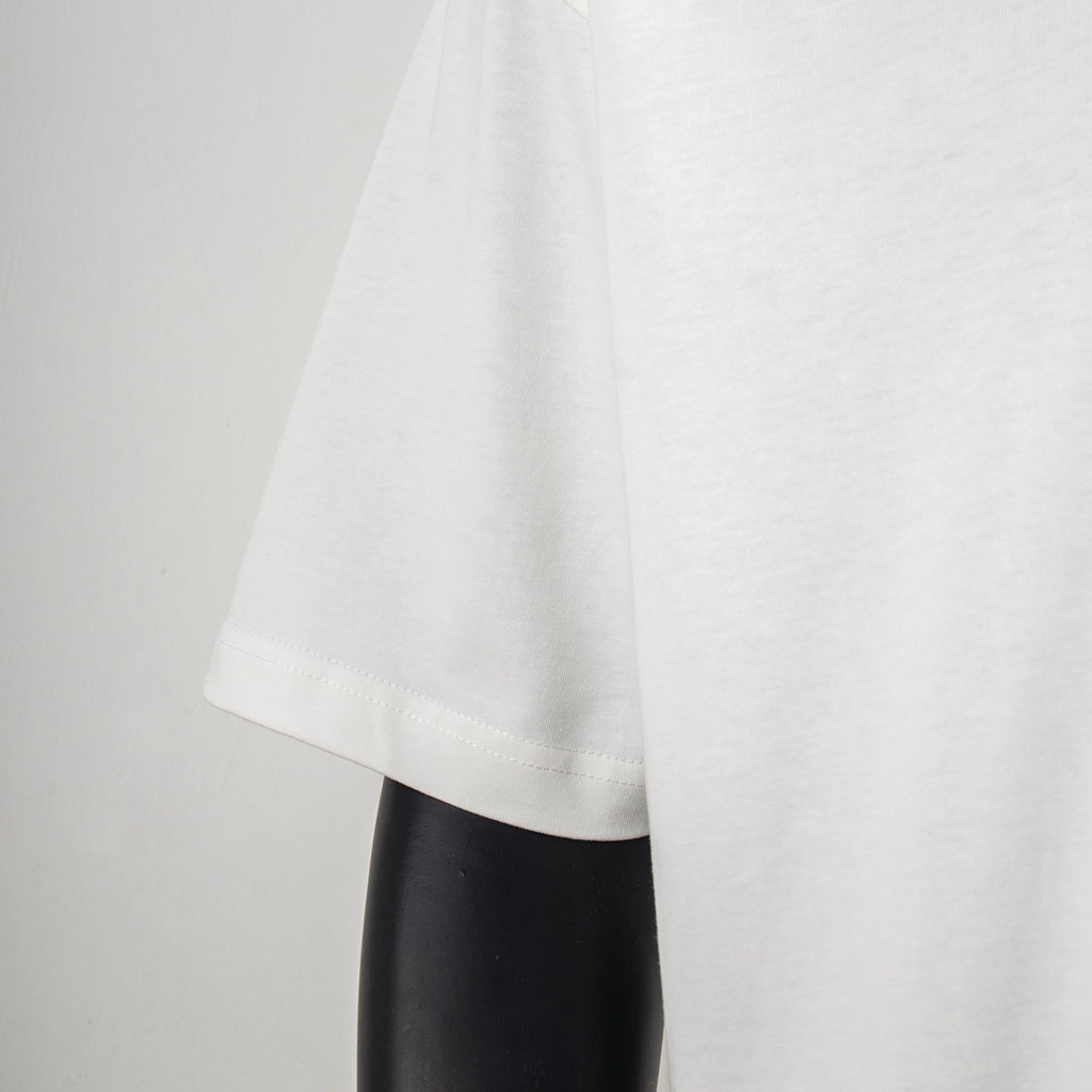 White short-sleeve T-shirt hem and side drape