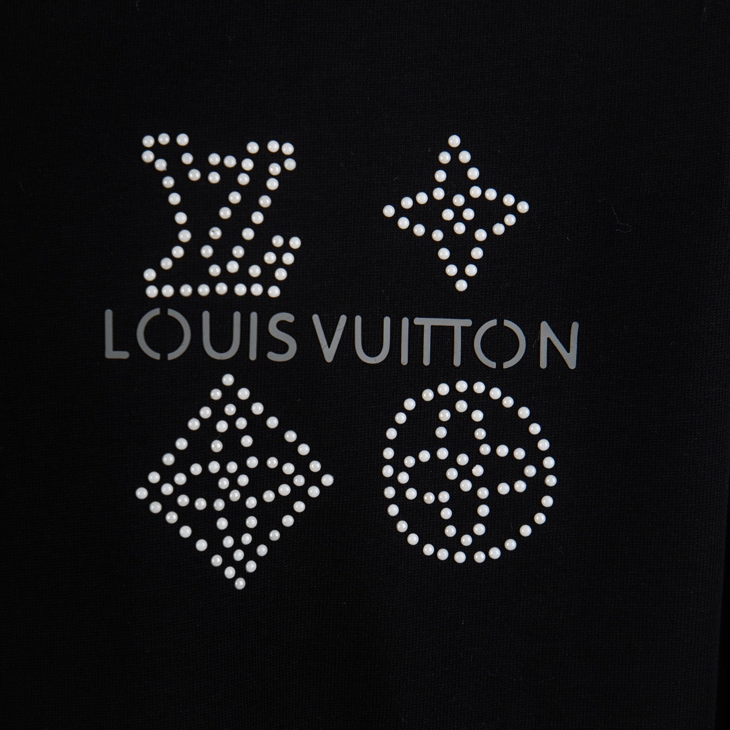 Black T-shirt front with rhinestone Louis Vuitton lettering and four emblem icons