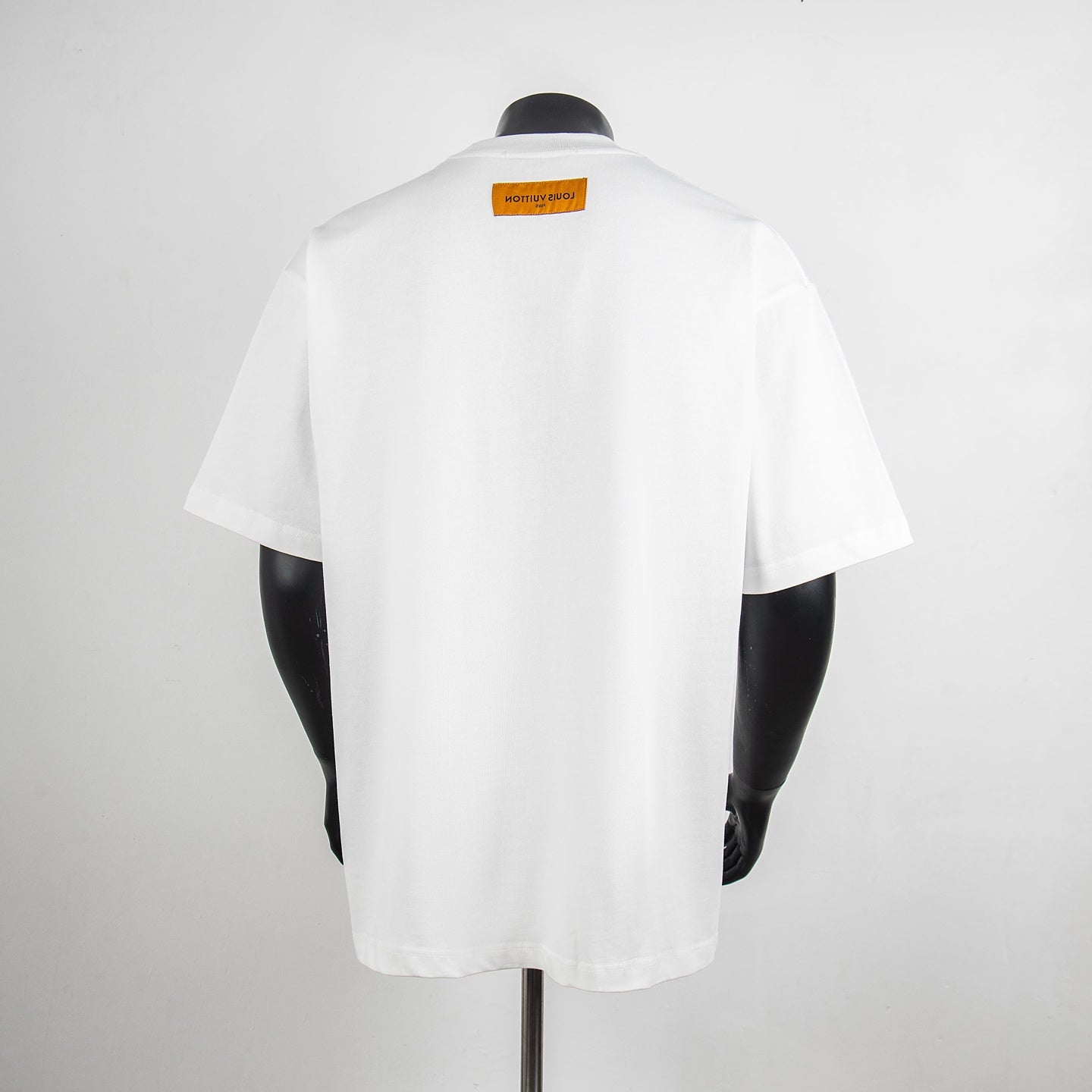 White crew-neck T-shirt with plain back and small neck label