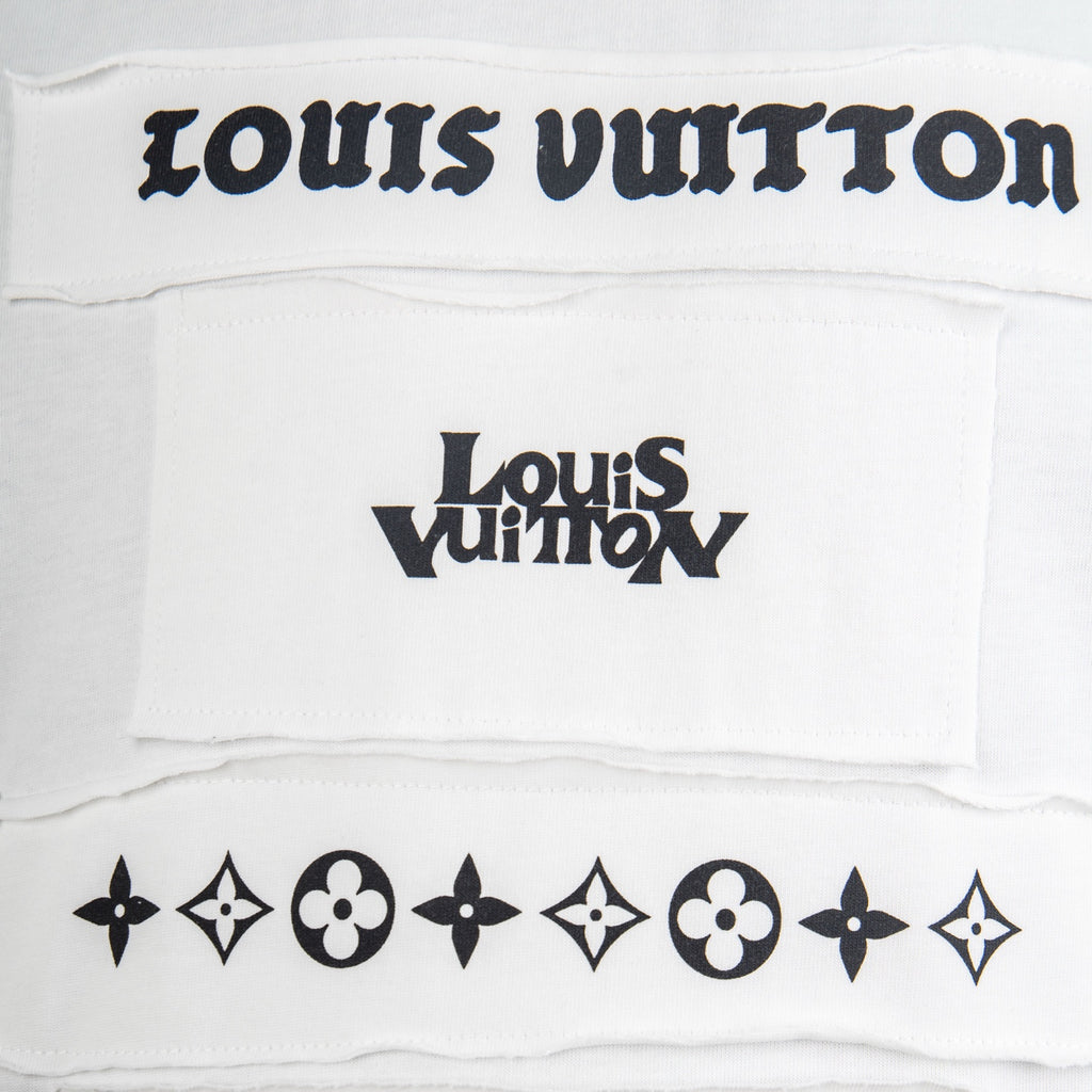 White T-shirt chest panel with black Louis Vuitton logo and decorative emblems