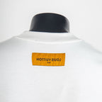White T-shirt back neck with orange brand label tag