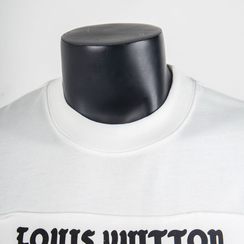 White T-shirt crew neck collar close-up with ribbed neckline detail