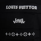 Black T-shirt close-up of Louis Vuitton front text and logo emblem row