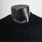 Black crew-neck T-shirt collar in knit fabric