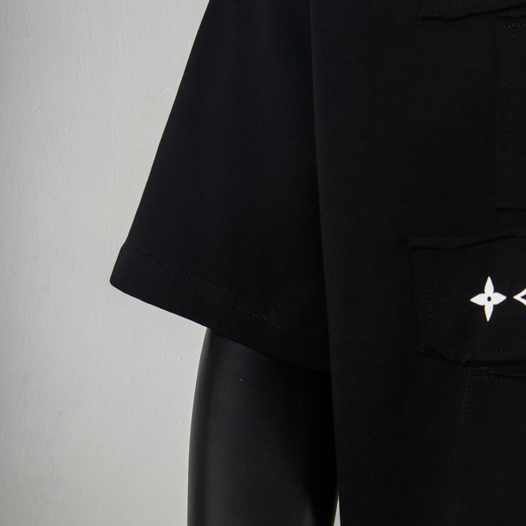 Black T-shirt side view with short sleeve and small logo detail