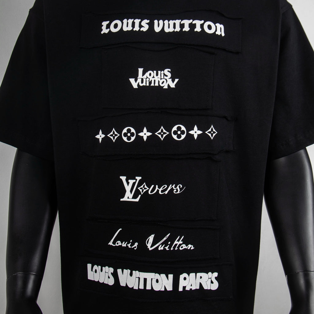 Black graphic T-shirt with stacked Louis Vuitton logos and emblem print